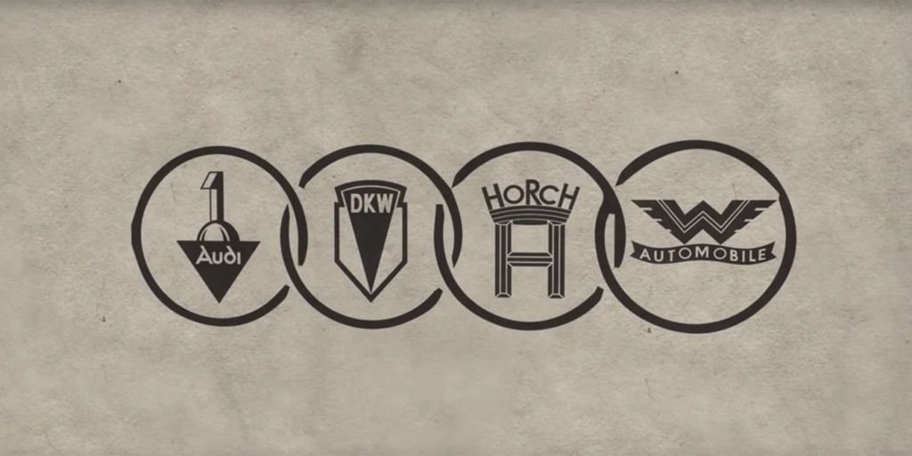 奧迪：差點變成五環不說，它還被國際奧委會起訴過 | 車標史